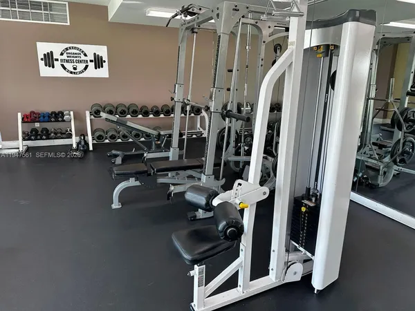 a view of a room with gym equipment