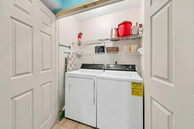 a utility room with dryer and washer