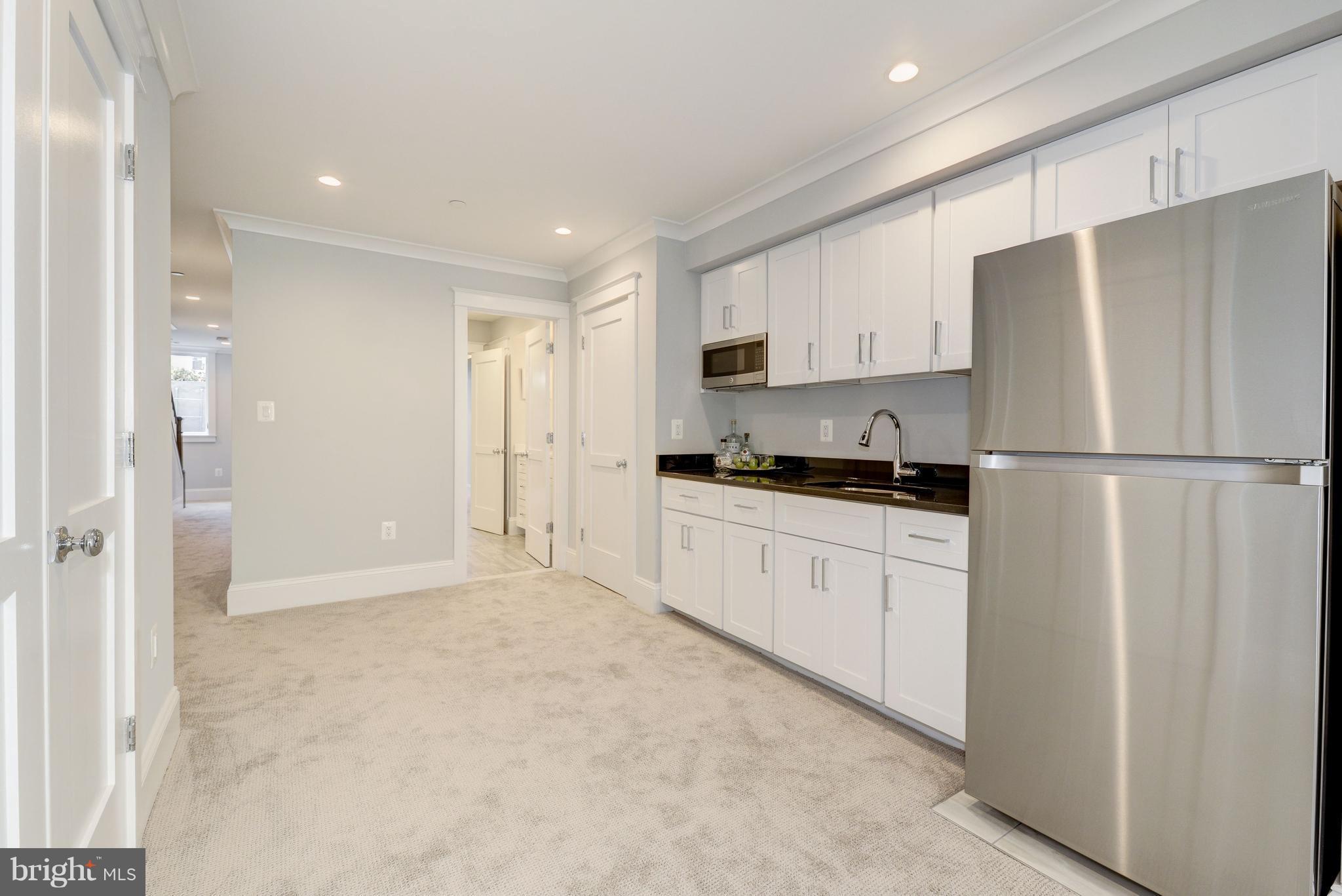 3616 T Street Northwest Washington, DC 20007 - Photo 24 of 29 LOWER LEVEL WET BAR| KITCHENETTE