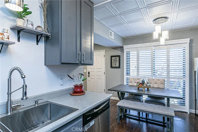 a kitchen with a table and a sink
