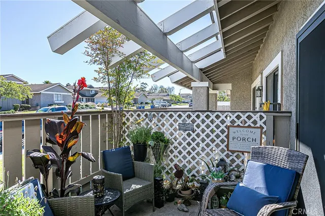 a view of a chairs and table in a patio