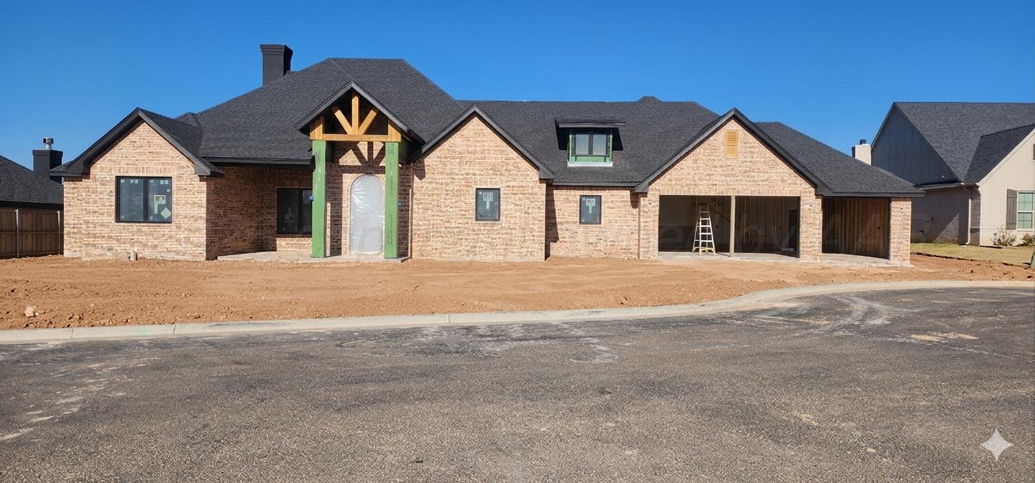 a front view of a house with a outdoor space