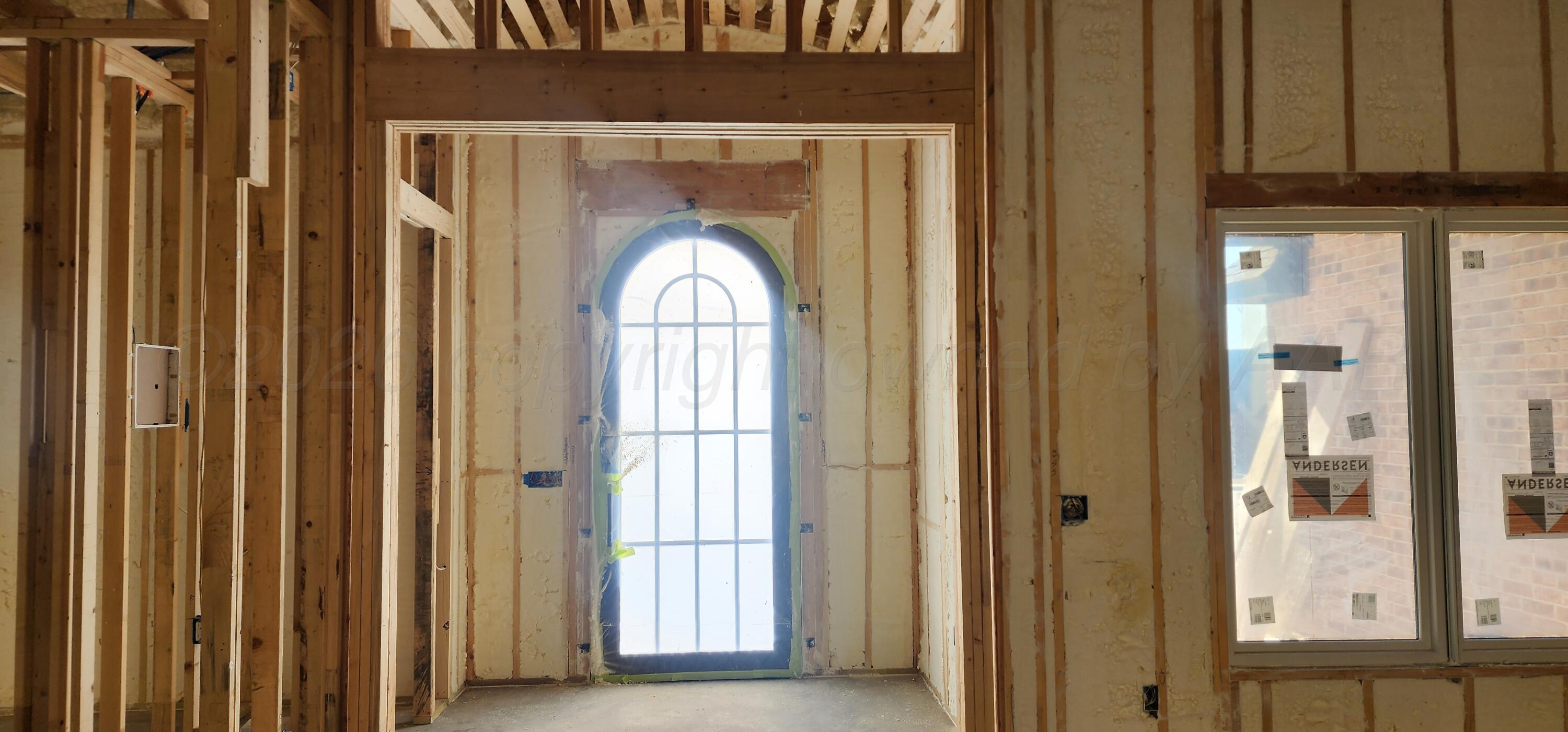 1104 Herring Ranch Road Amarillo, TX 79124 - Photo 2 of 6 a view of a wooden door with a glass door