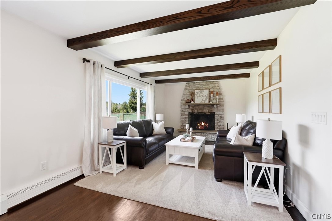 9389 Caughdenoy Road Clay, NY 13029 - Photo 23 of 50 Cozy up by the fire!