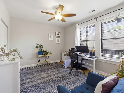 a workspace with furniture and window