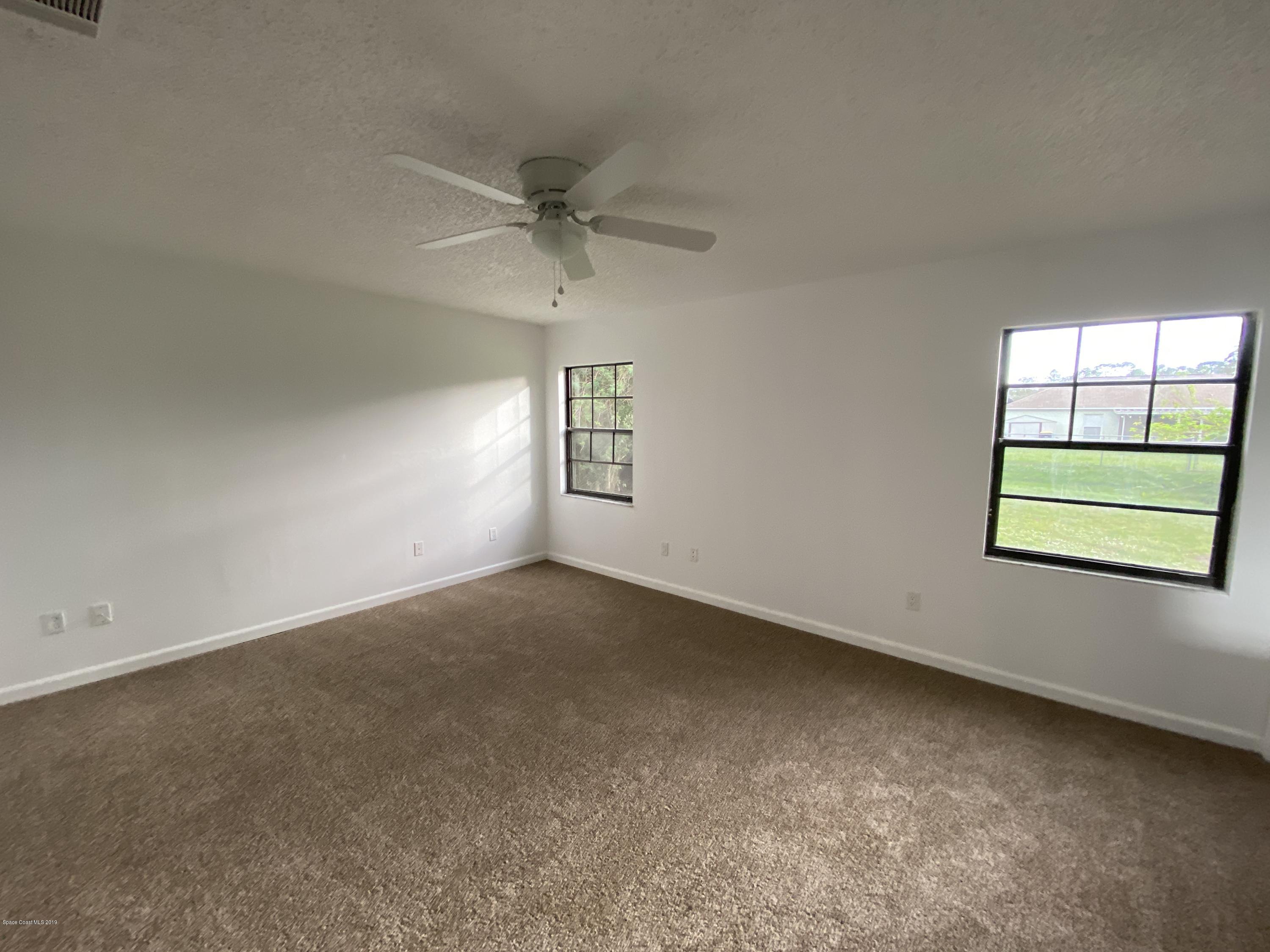 346 Mott Street Southwest Palm Bay, FL 32908 - Photo 6 of 13 Master Bedroom