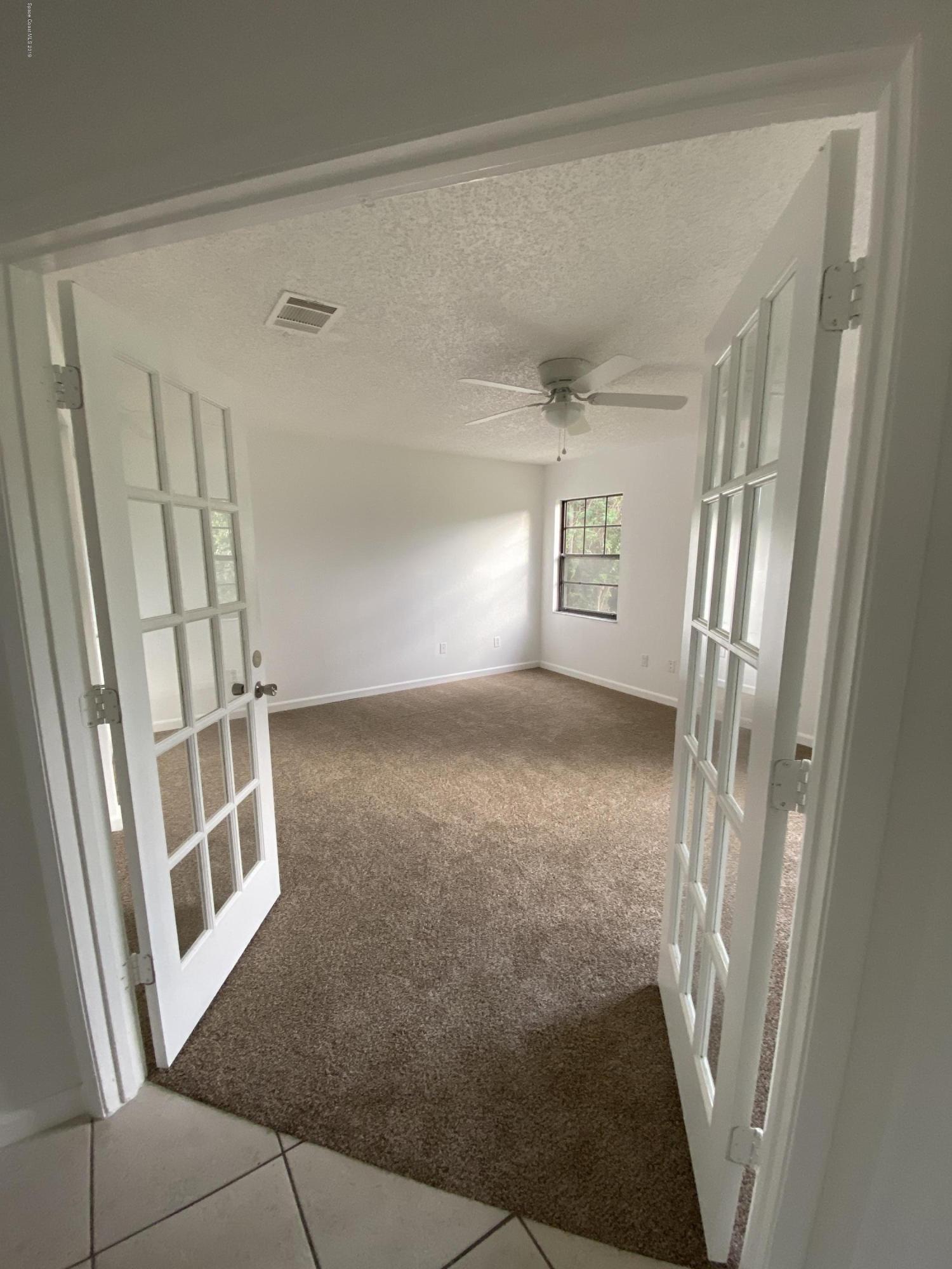 346 Mott Street Southwest Palm Bay, FL 32908 - Photo 7 of 13 Master Bedroom