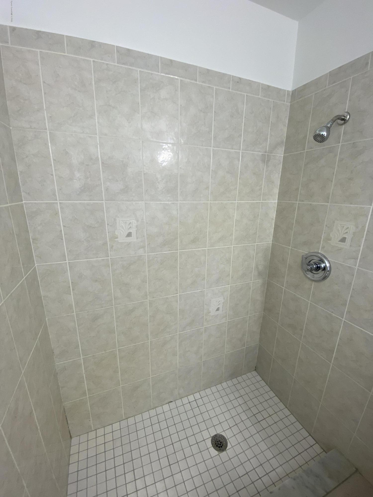 346 Mott Street Southwest Palm Bay, FL 32908 - Photo 10 of 13 Custom Tile Shower