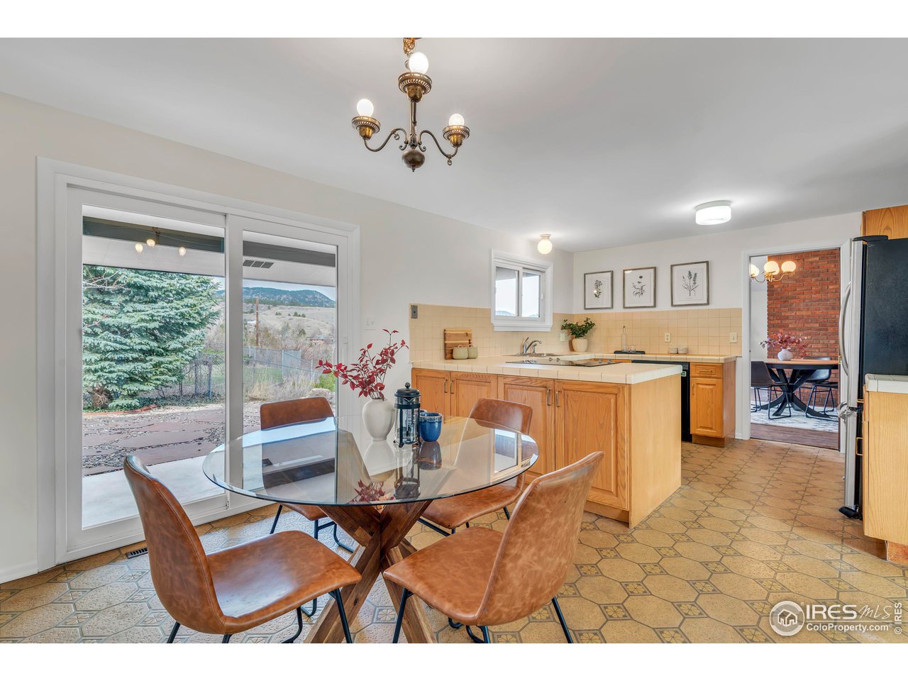 2425 Vassar Drive Boulder, CO 80305 - Photo 12 of 30 a view of a dining room with furniture and a livingroom