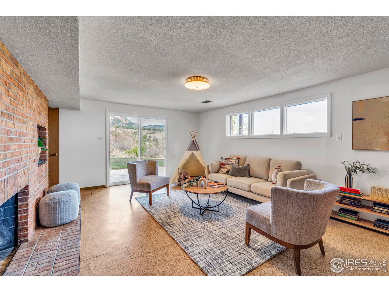 2425 Vassar Drive Boulder, CO 80305 - Photo 23 of 30 a living room with furniture and a potted plant