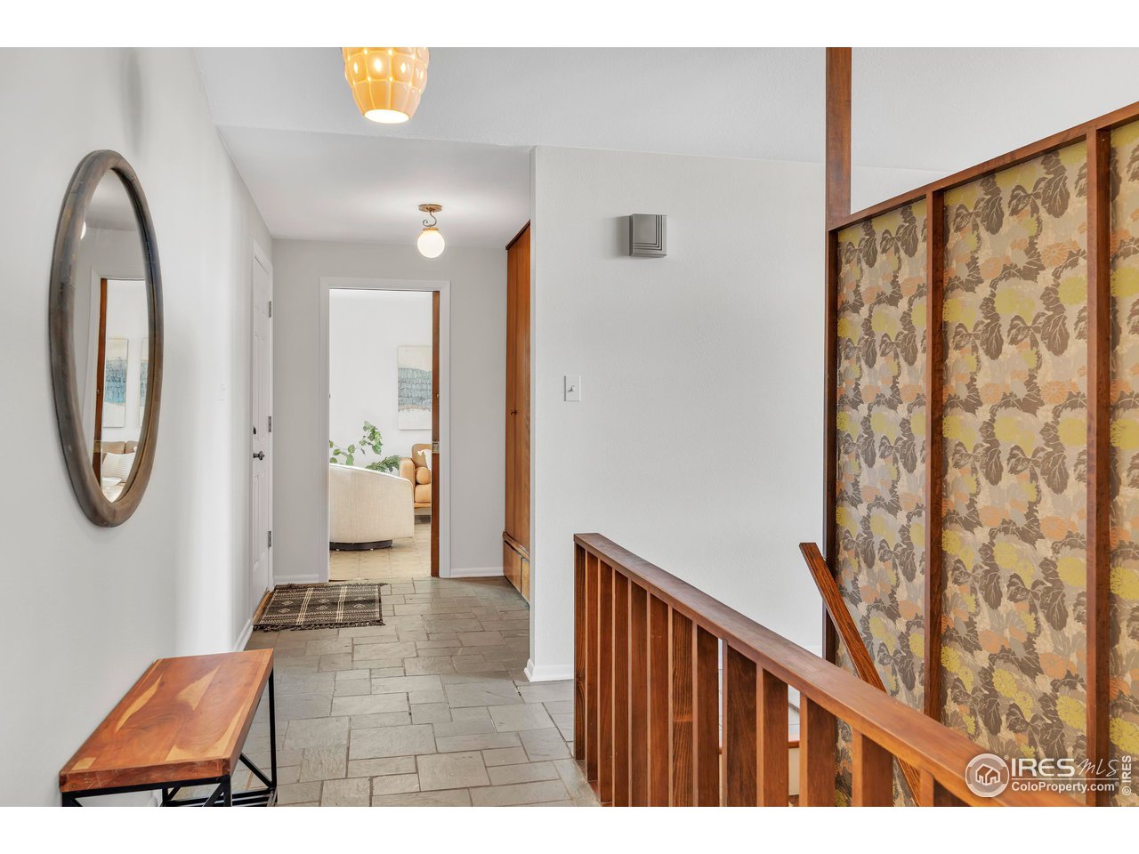 2425 Vassar Drive Boulder, CO 80305 - Photo 3 of 30 a picture of a room with furniture and wooden floor