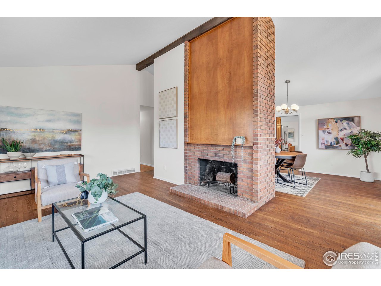 2425 Vassar Drive Boulder, CO 80305 - Photo 7 of 30 a living room with furniture and a fireplace