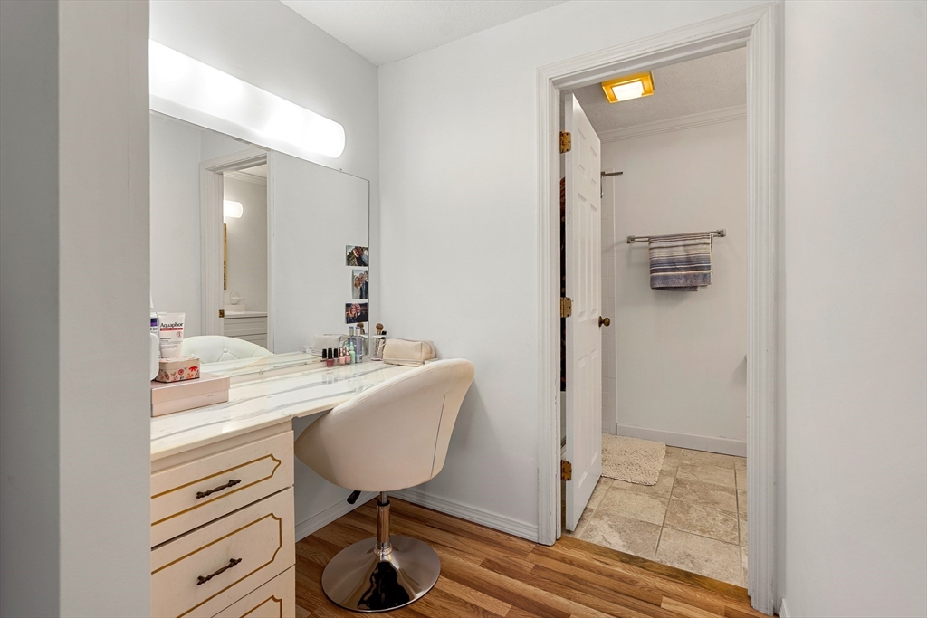 181 Littleton Road, Unit 134 Chelmsford, MA 01824 - Photo 13 of 20 a bathroom with a sink a toilet and shower