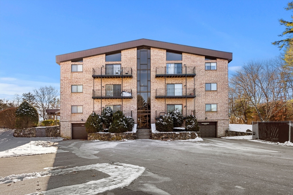 181 Littleton Road, Unit 134 Chelmsford, MA 01824 - Photo 15 of 20 a front view of a building