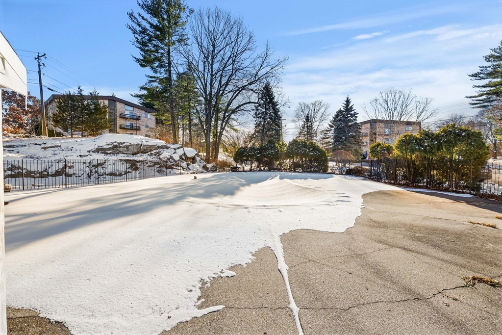 181 Littleton Road, Unit 134 Chelmsford, MA 01824 - Photo 19 of 20 a view of road with a building in the background