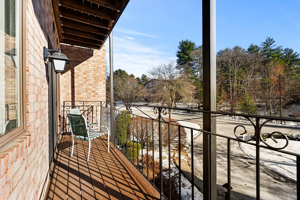 181 Littleton Road, Unit 134 Chelmsford, MA 01824 - Photo 6 of 20 a view of balcony with chairs