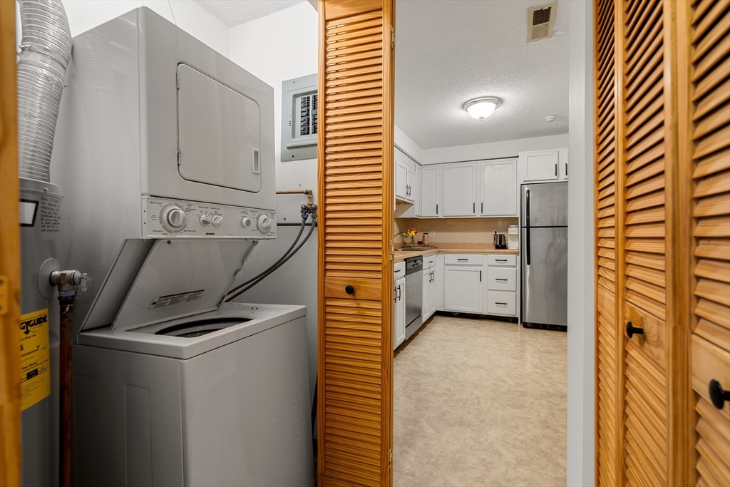 181 Littleton Road, Unit 134 Chelmsford, MA 01824 - Photo 9 of 20 a view of kitchen and utility room