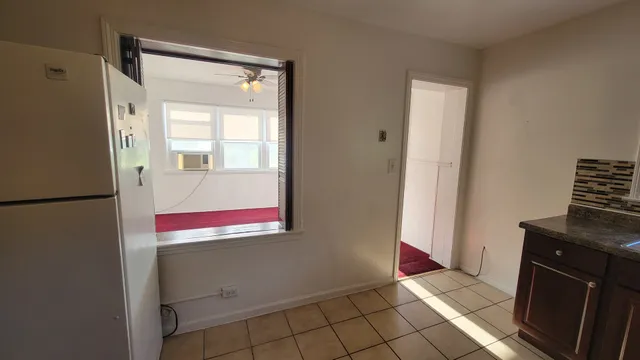 a room with windows and a table