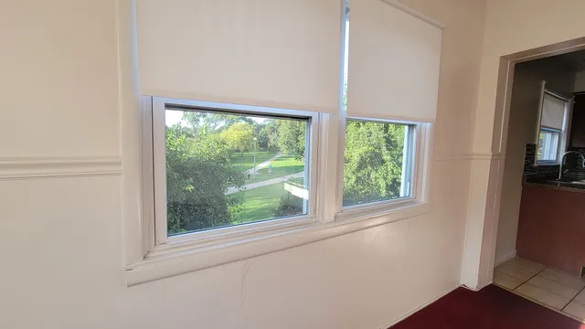 a view of a room that has a window in it