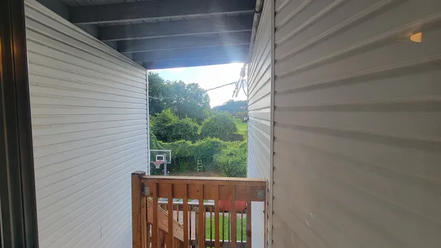 a view of a porch with a door