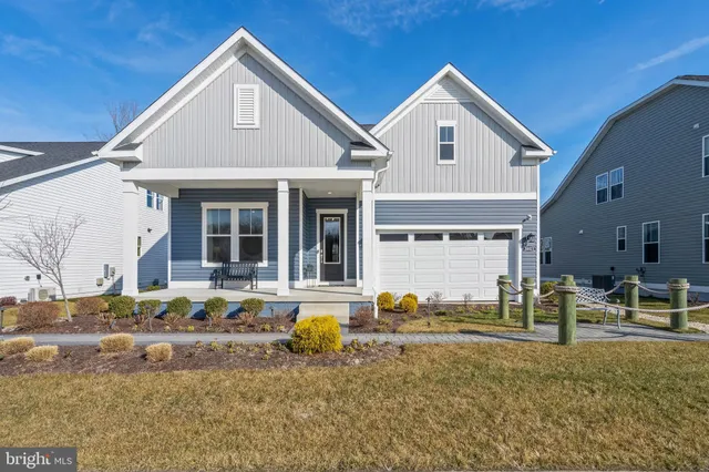 a front view of a house with a outdoor space
