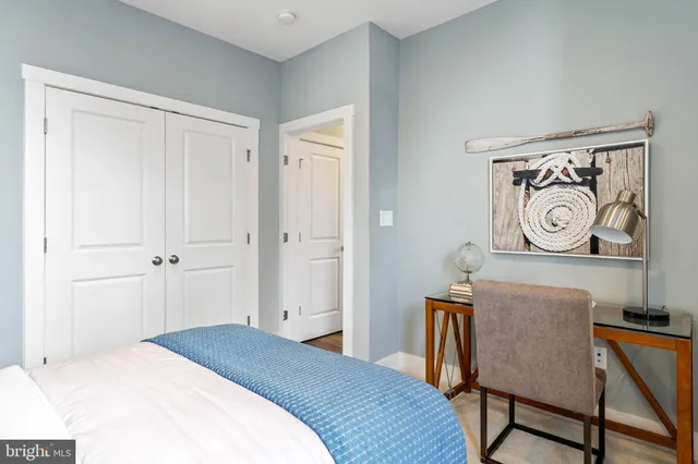 a view of a house with swimming pool and porch with furniture