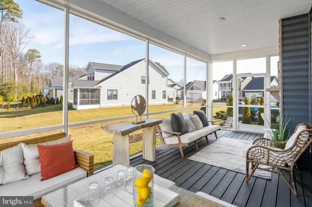 a view of a house with backyard and swimming pool
