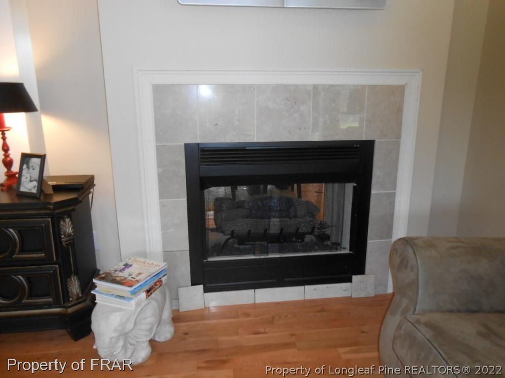6257 Howell Road Lumberton, NC 28358 - Photo 15 of 34 a living room with furniture and a fireplace