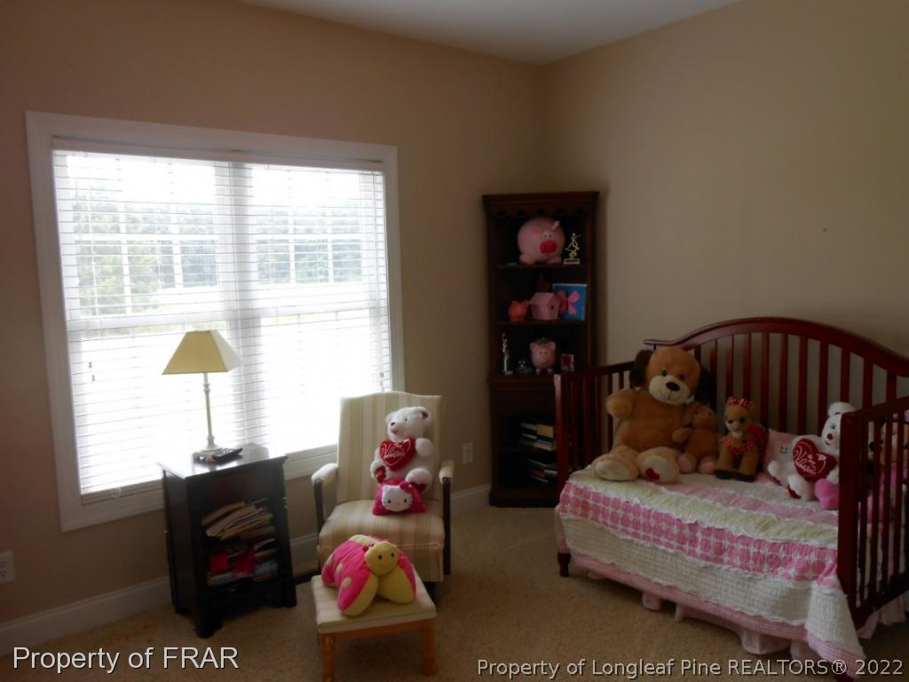6257 Howell Road Lumberton, NC 28358 - Photo 24 of 34 a bedroom with a bed and a window