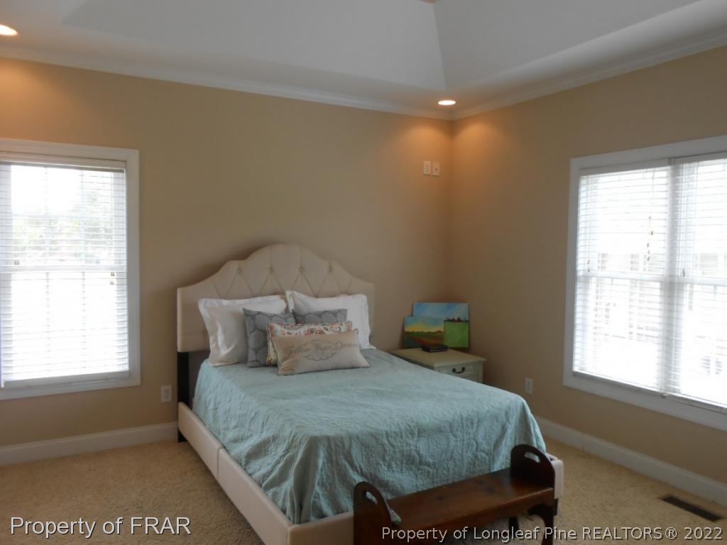 6257 Howell Road Lumberton, NC 28358 - Photo 27 of 34 a bedroom with a bed and window