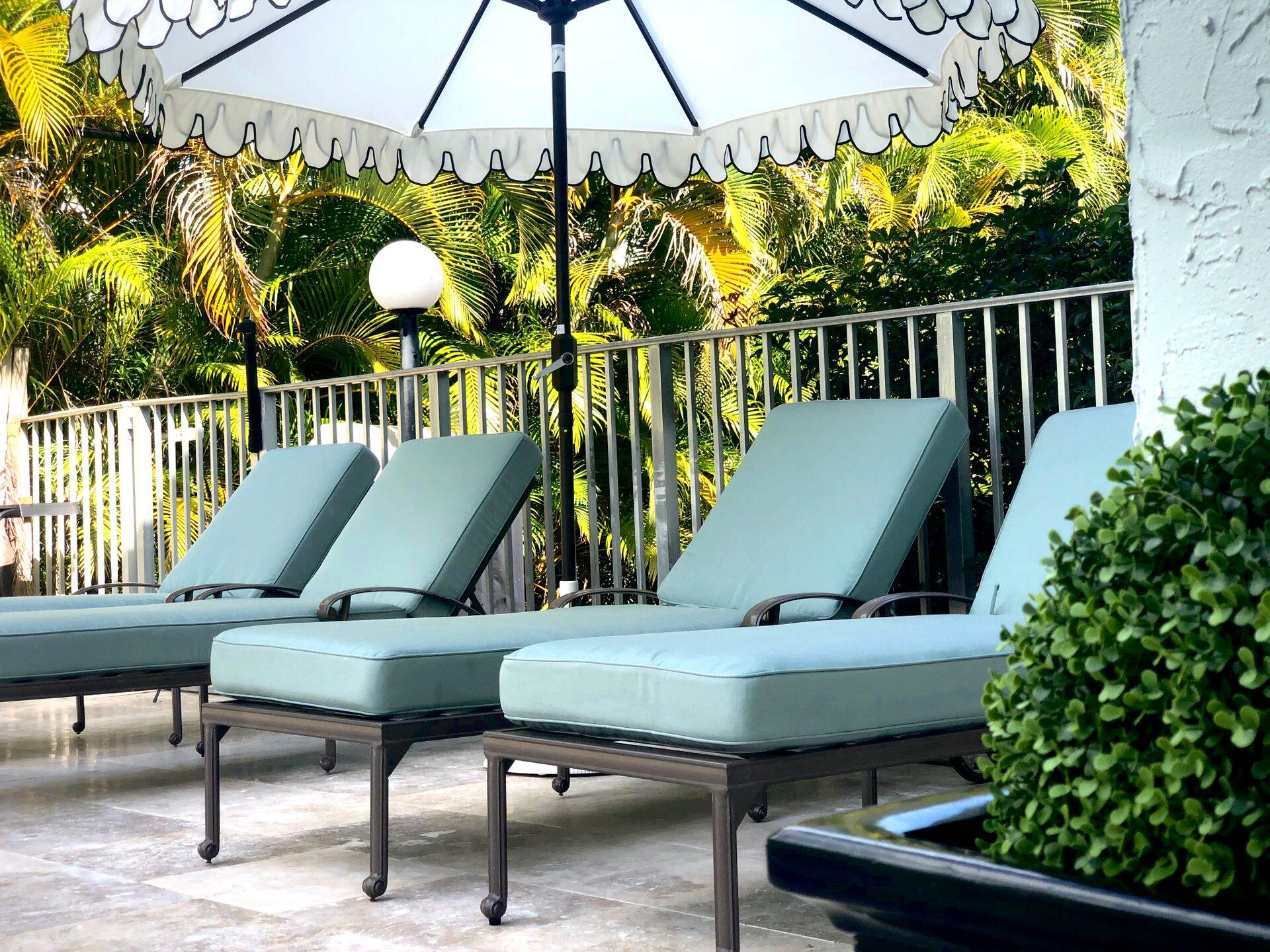 665 Glouchester Street, Unit 6 Boca Raton, FL 33487 - Photo 11 of 16 a view of a chairs and table in the patio