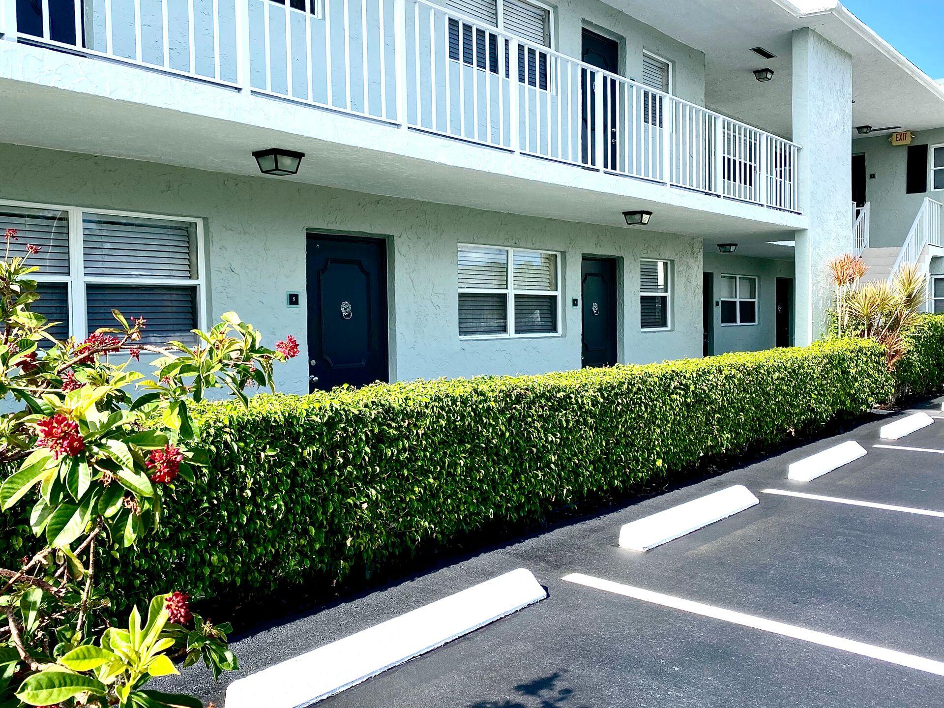 665 Glouchester Street, Unit 6 Boca Raton, FL 33487 - Photo 15 of 16 a front view of a building