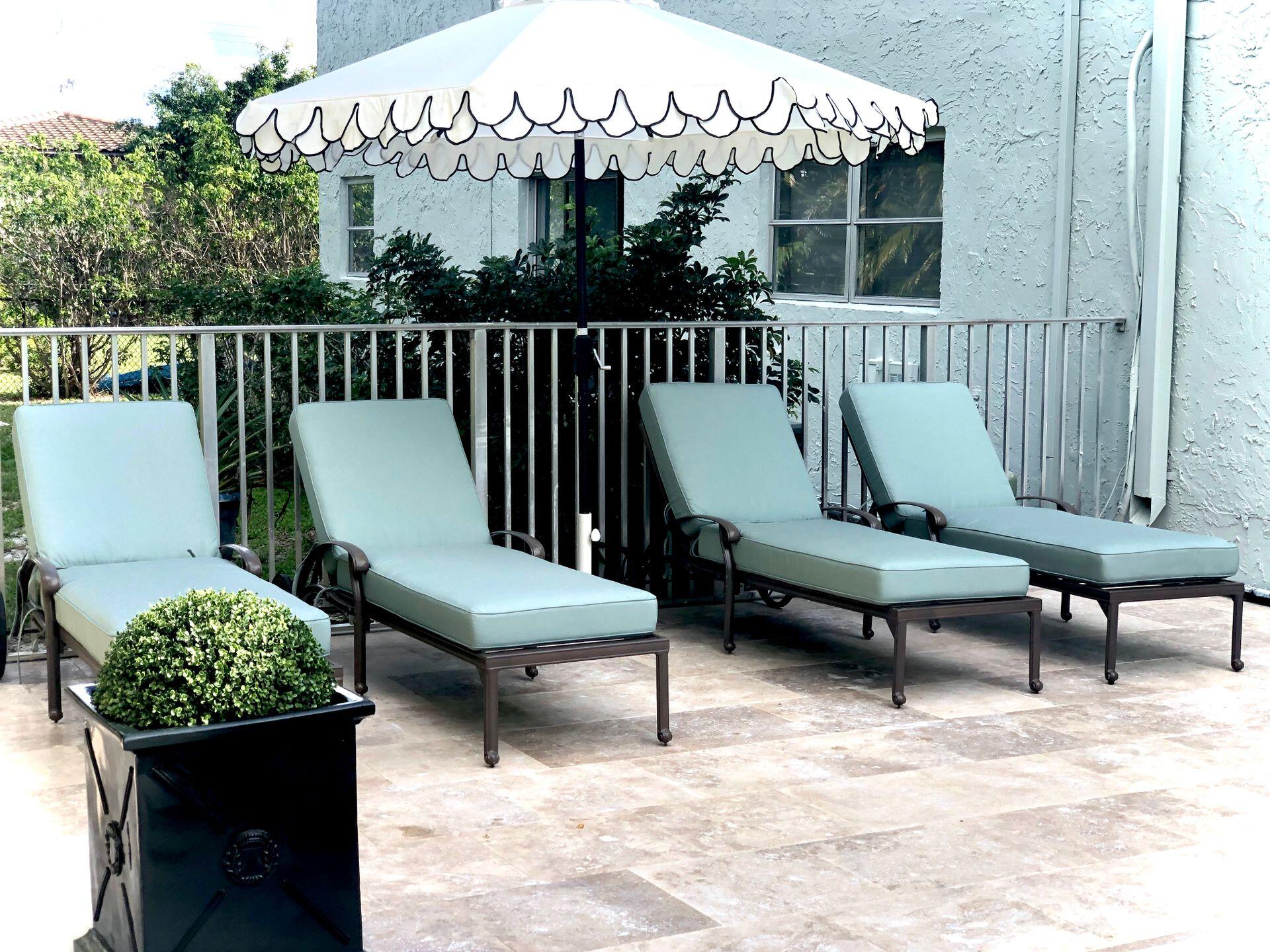 665 Glouchester Street, Unit 6 Boca Raton, FL 33487 - Photo 10 of 16 a view of a chairs in wooden deck