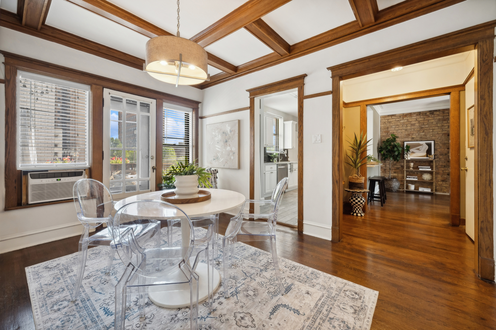 3749 North Pine Grove Avenue, Unit 3 Chicago, IL 60613 - Photo 9 of 18 a living room with furniture and a large window