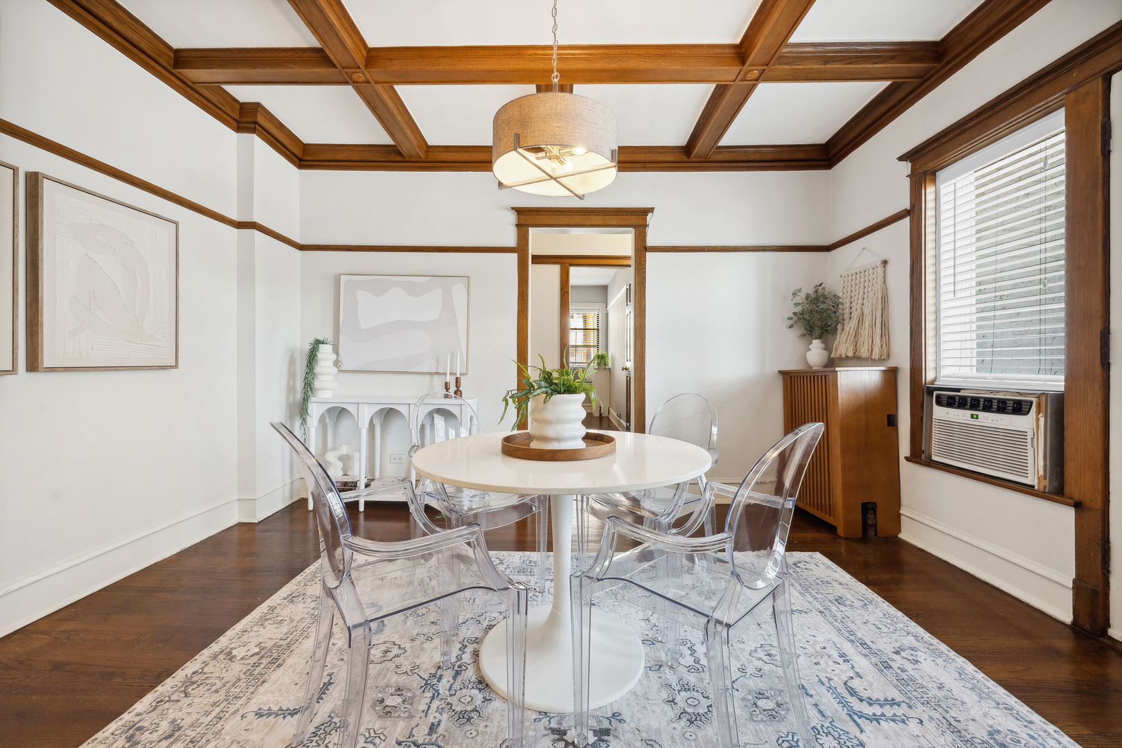 3749 North Pine Grove Avenue, Unit 3 Chicago, IL 60613 - Photo 10 of 18 a view of a dining room with furniture window and wooden floor