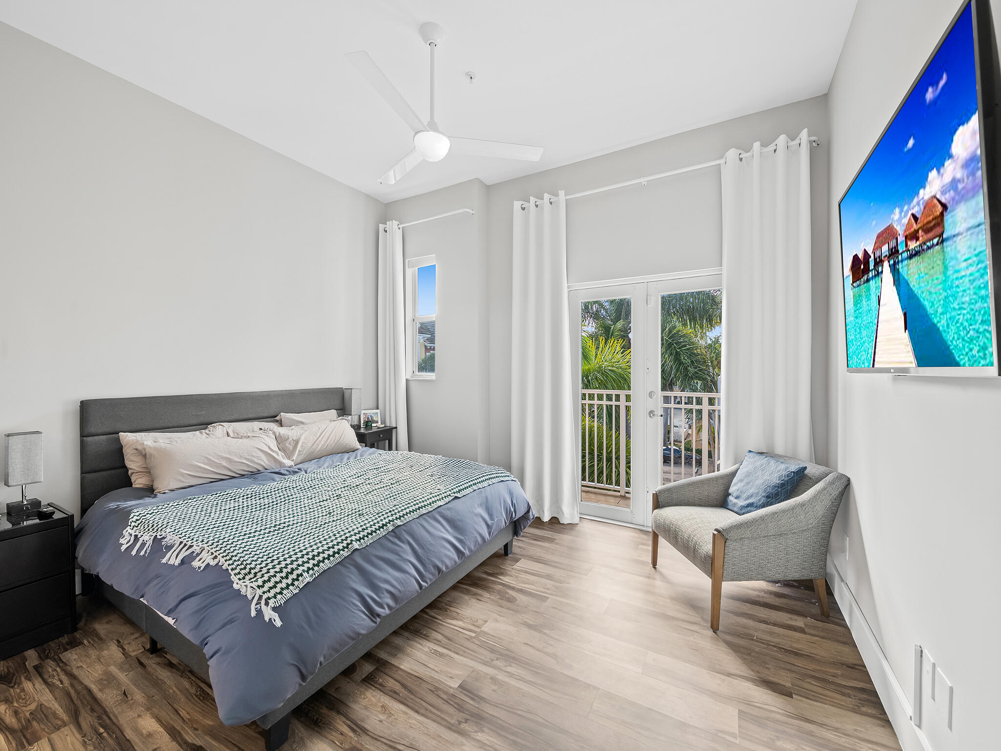 2331 Vintage Drive Lighthouse Point, FL 33064 - Photo 14 of 22 a bedroom with a bed and a large window