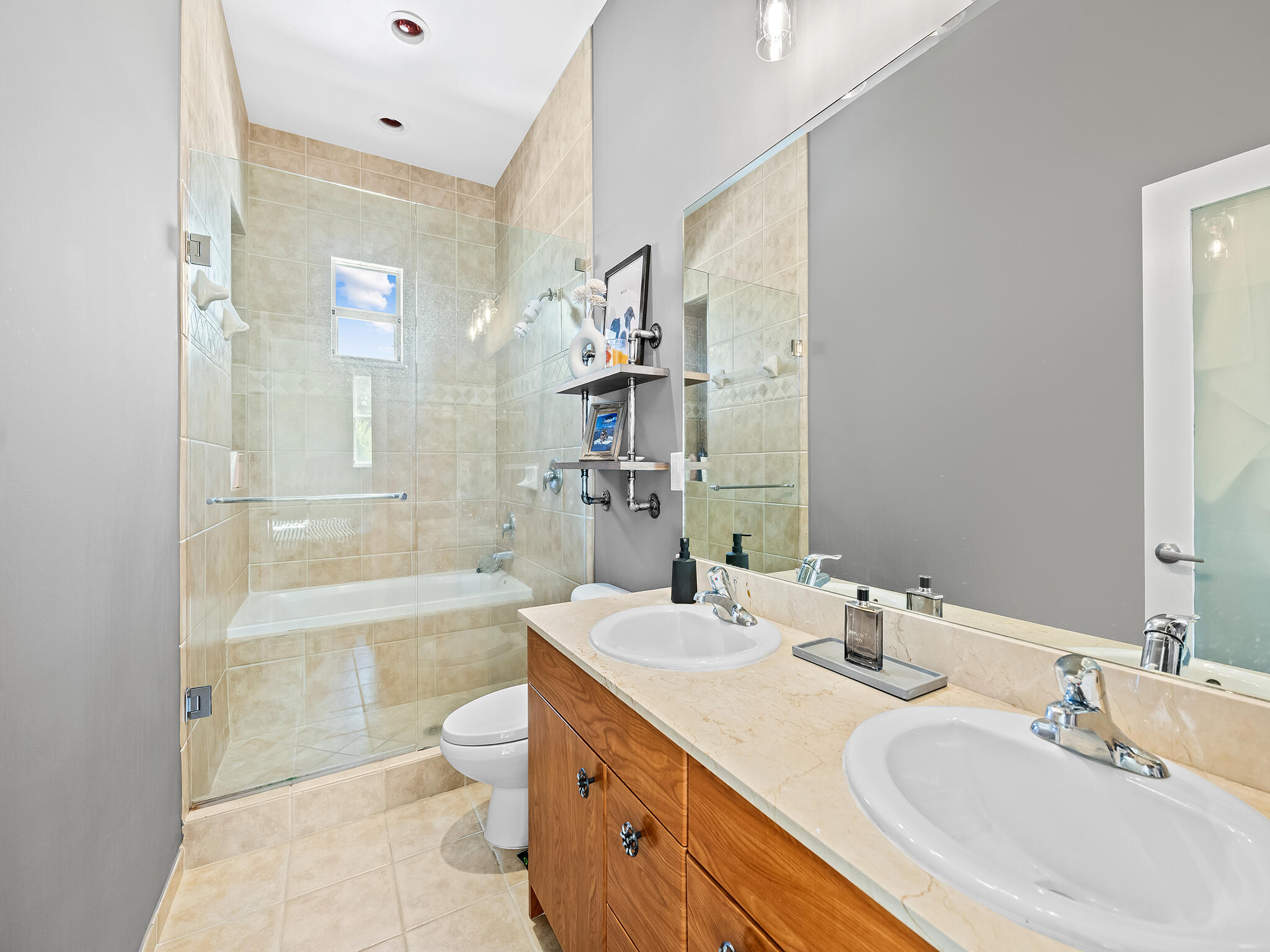 2331 Vintage Drive Lighthouse Point, FL 33064 - Photo 17 of 22 a bathroom with a granite countertop sink toilet tub and shower