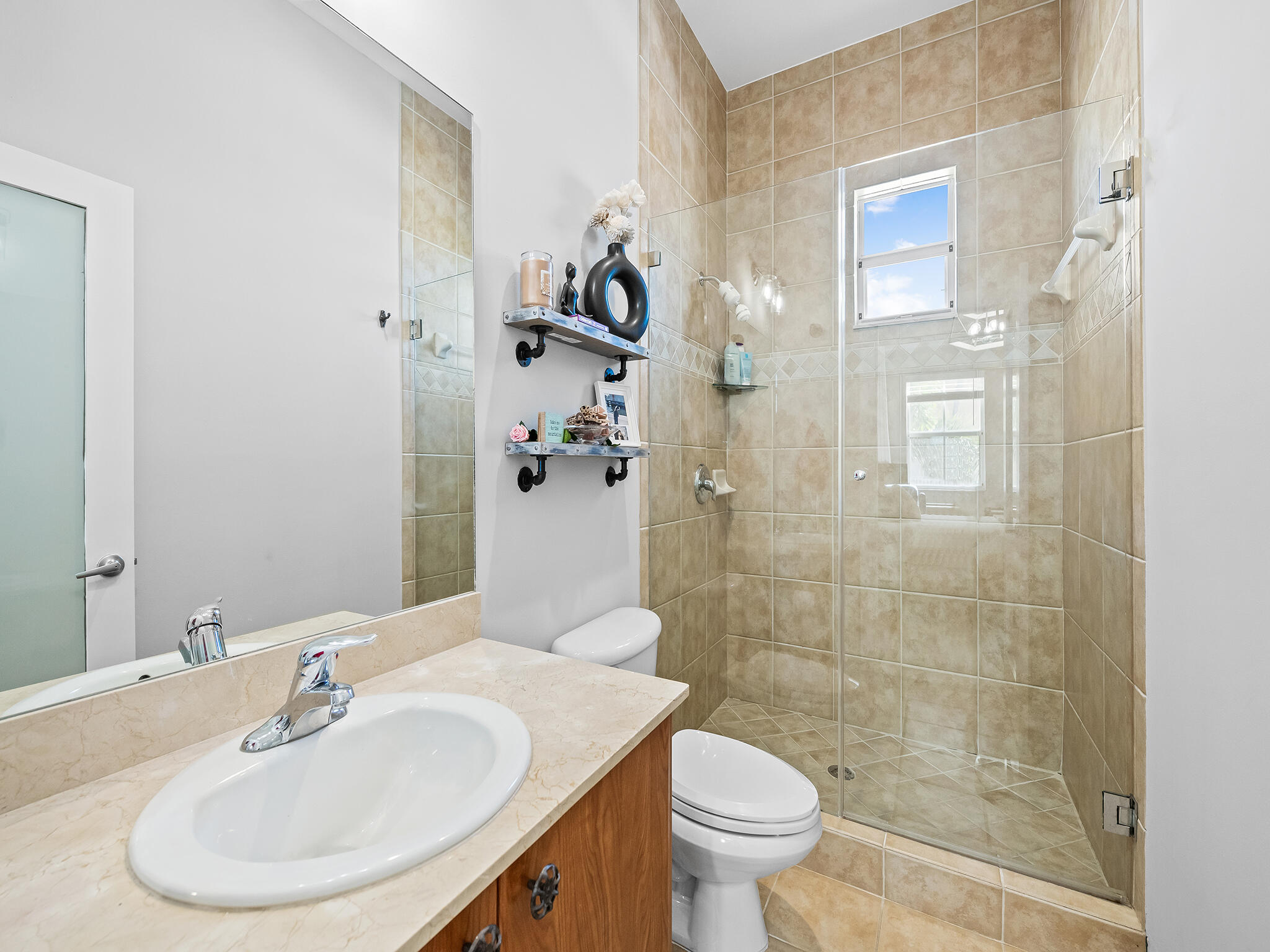 2331 Vintage Drive Lighthouse Point, FL 33064 - Photo 21 of 22 a bathroom with a sink a toilet and shower