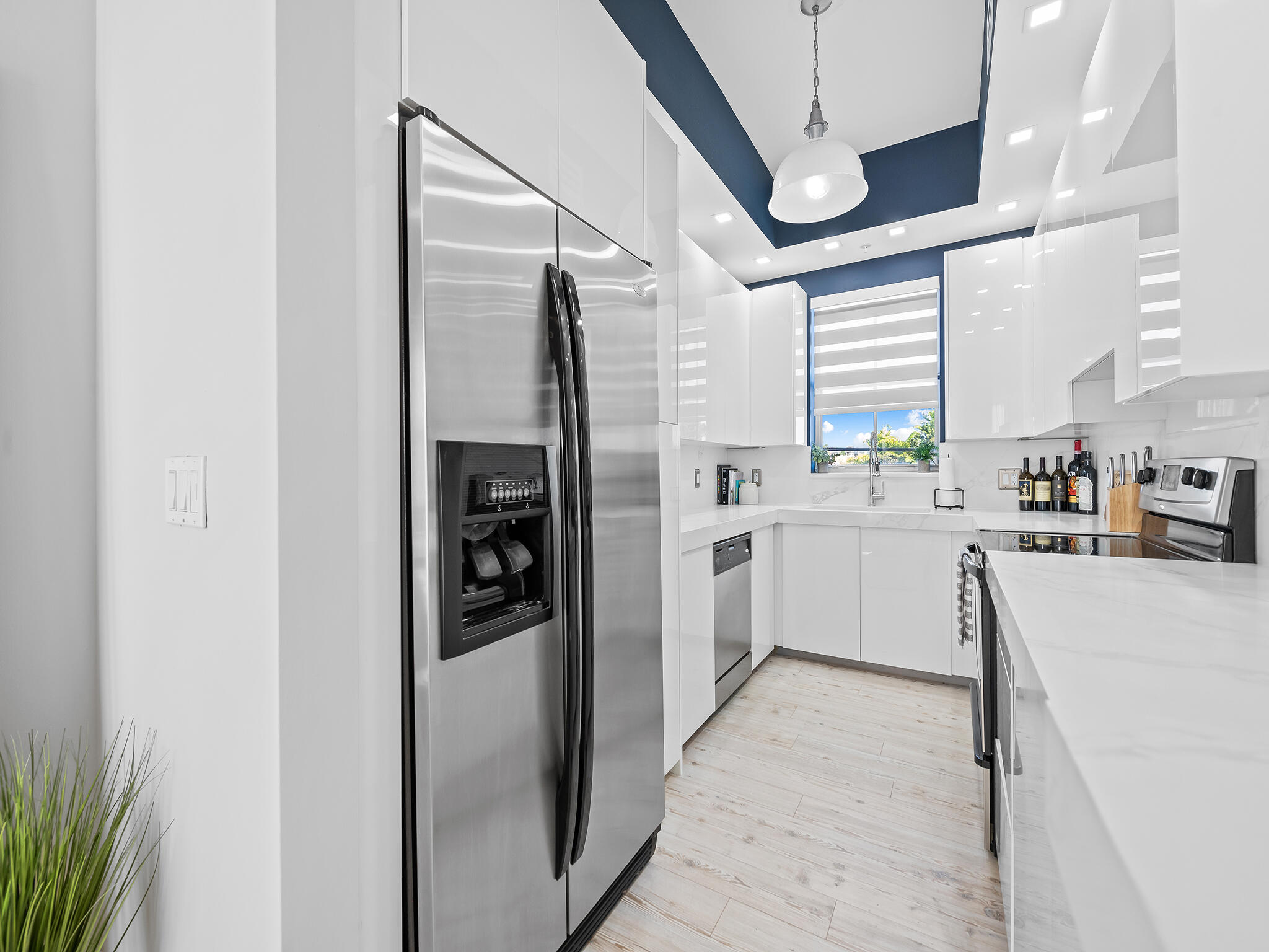 2331 Vintage Drive Lighthouse Point, FL 33064 - Photo 8 of 22 a kitchen with a refrigerator and a sink