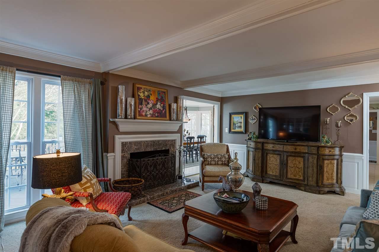 1405 Pony Run Road Raleigh, NC 27615 - Photo 12 of 28 WET BAR AND WOOD BURNING FIREPLACE