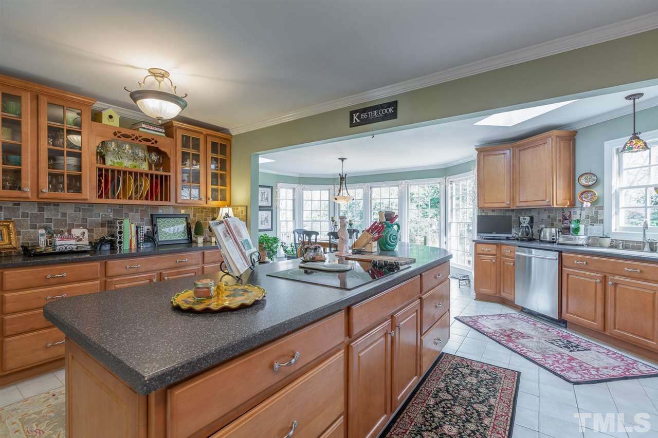 1405 Pony Run Road Raleigh, NC 27615 - Photo 7 of 28 VERY LARGE KITCHEN, CORIAN COUNTER TOPS, 3 PANTRIES IN KITCHEN