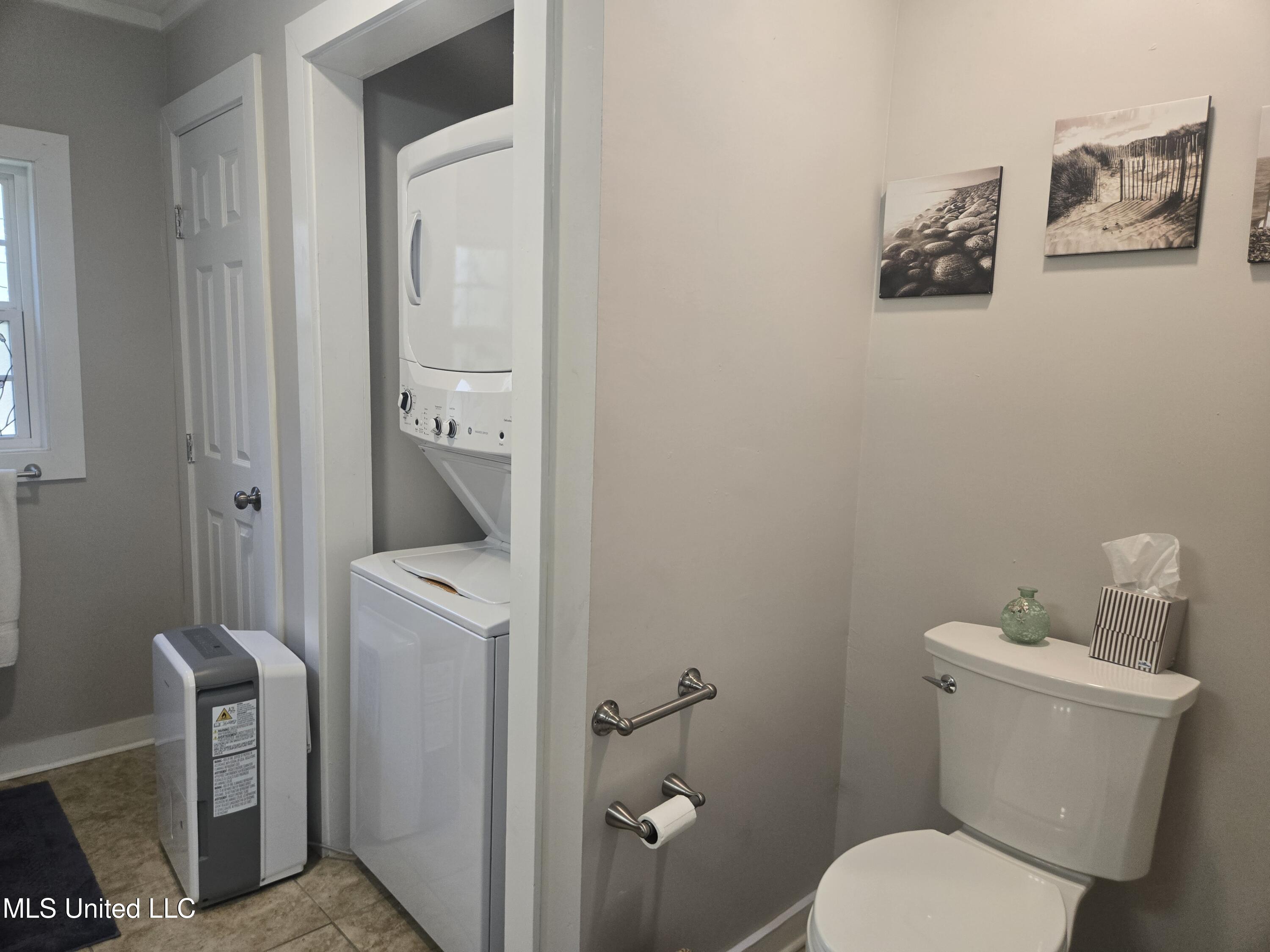 15593 Walter Smith Road Gulfport, MS 39503 - Photo 11 of 30 Master Bathroom-Laundry