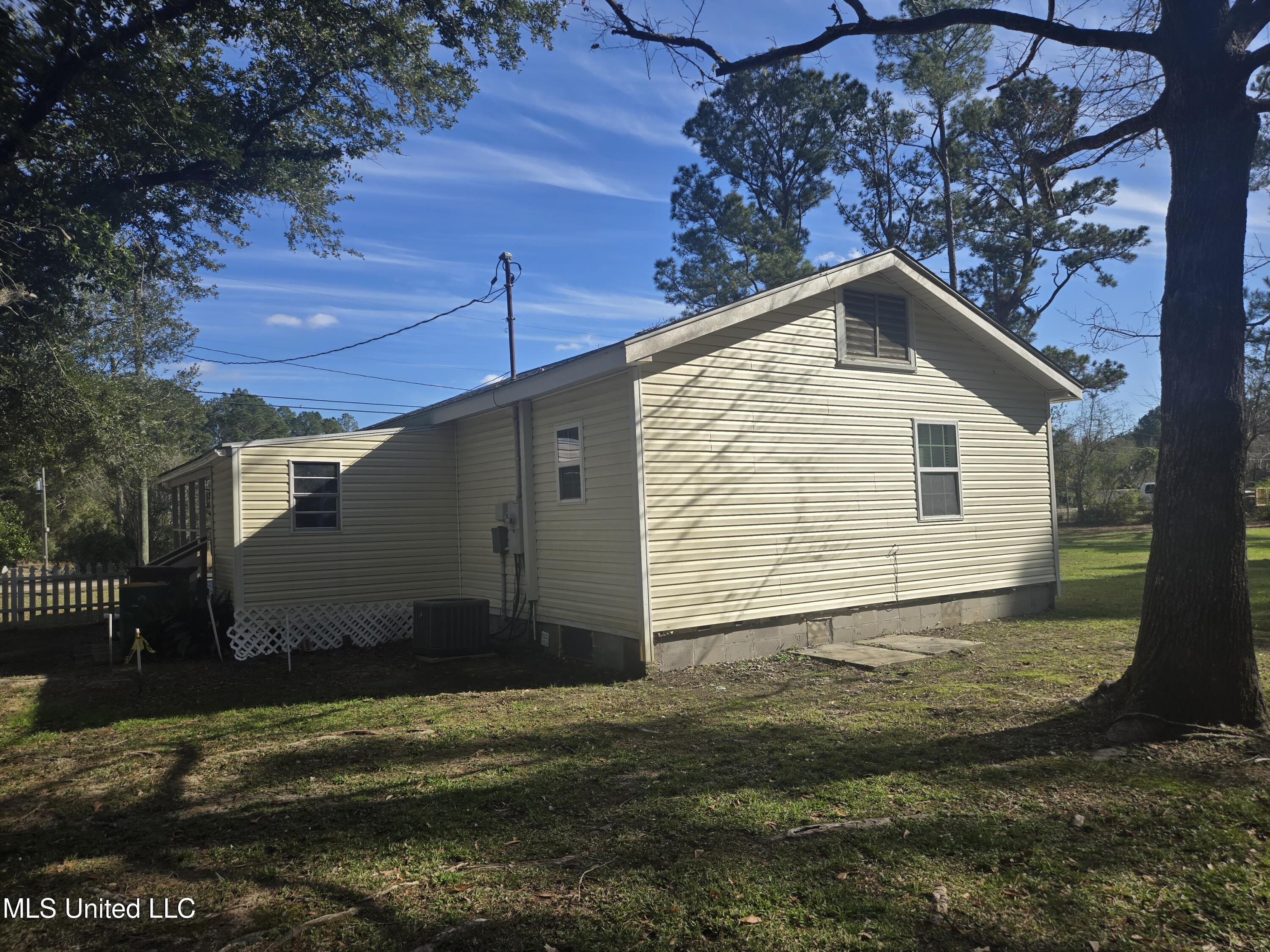 15593 Walter Smith Road Gulfport, MS 39503 - Photo 21 of 30 West Side Of Home