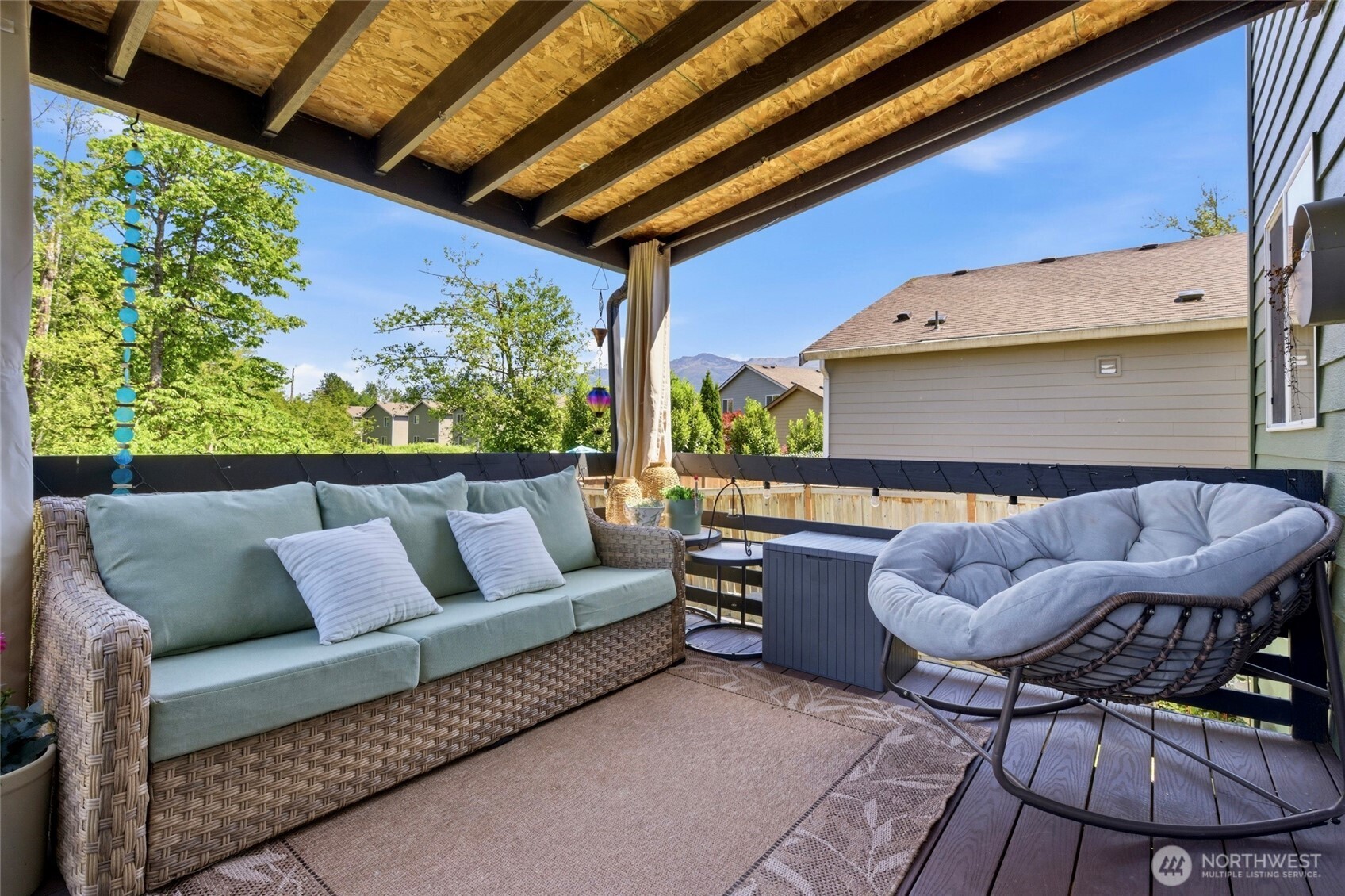 14005 Cedar Court Sultan, WA 98294 - Photo 34 of 38 a roof deck with a table and chairs