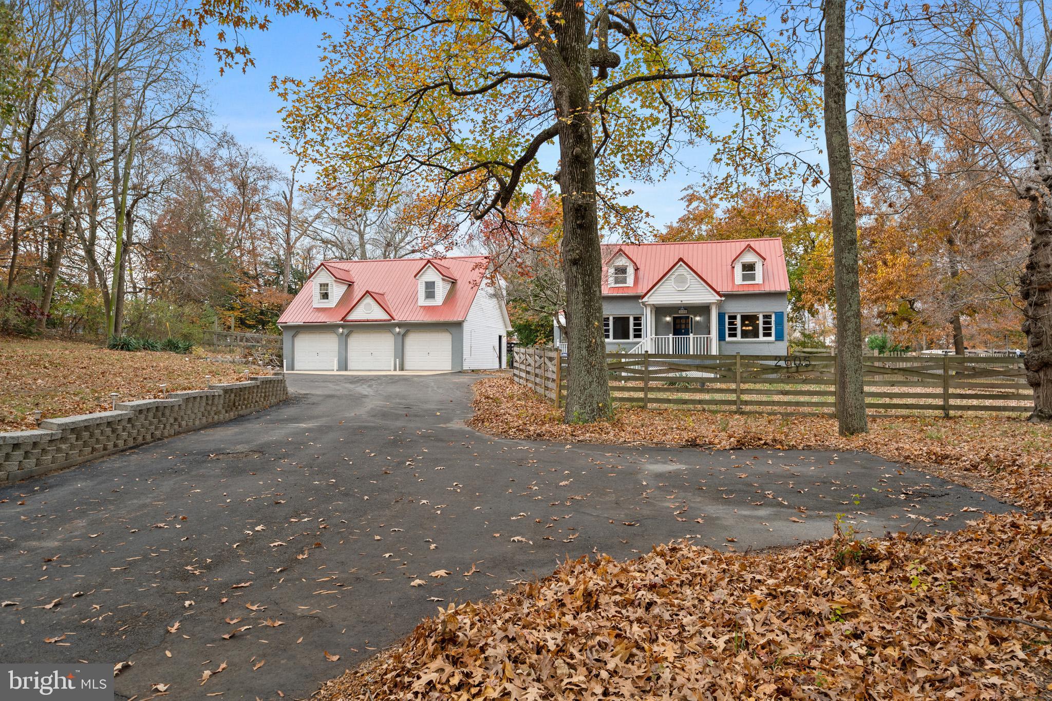 a street sign on a sidewalk next to a road