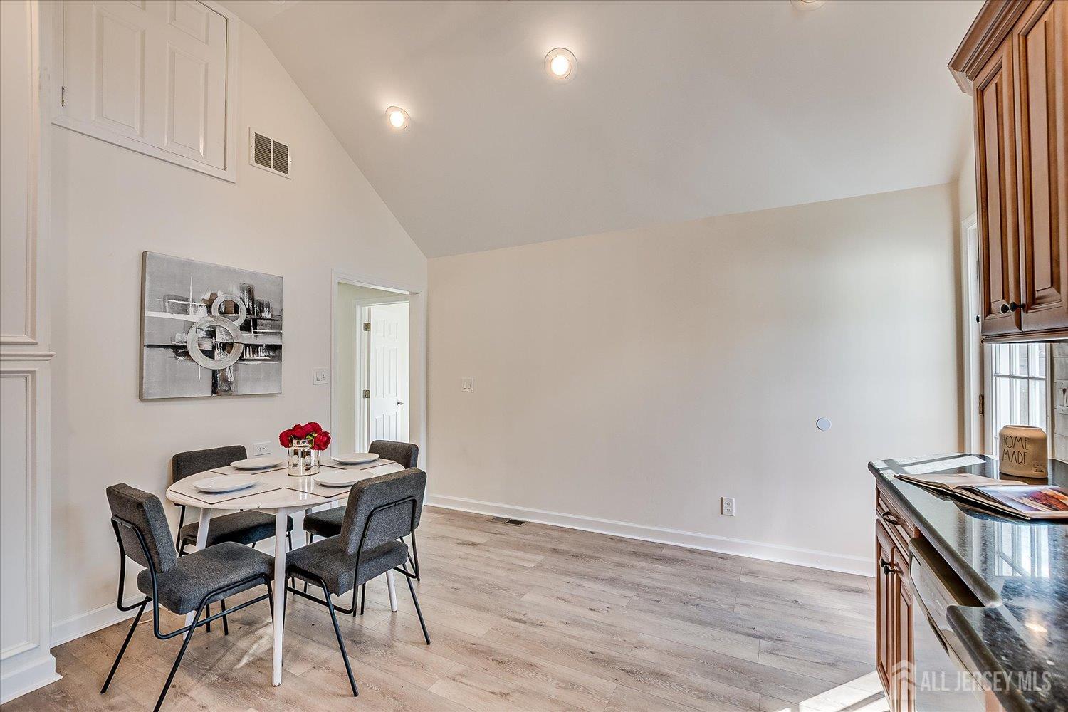 341 Victor Place Neptune, NJ 07753 - Photo 18 of 45 a view of a dining room with furniture and wooden floor