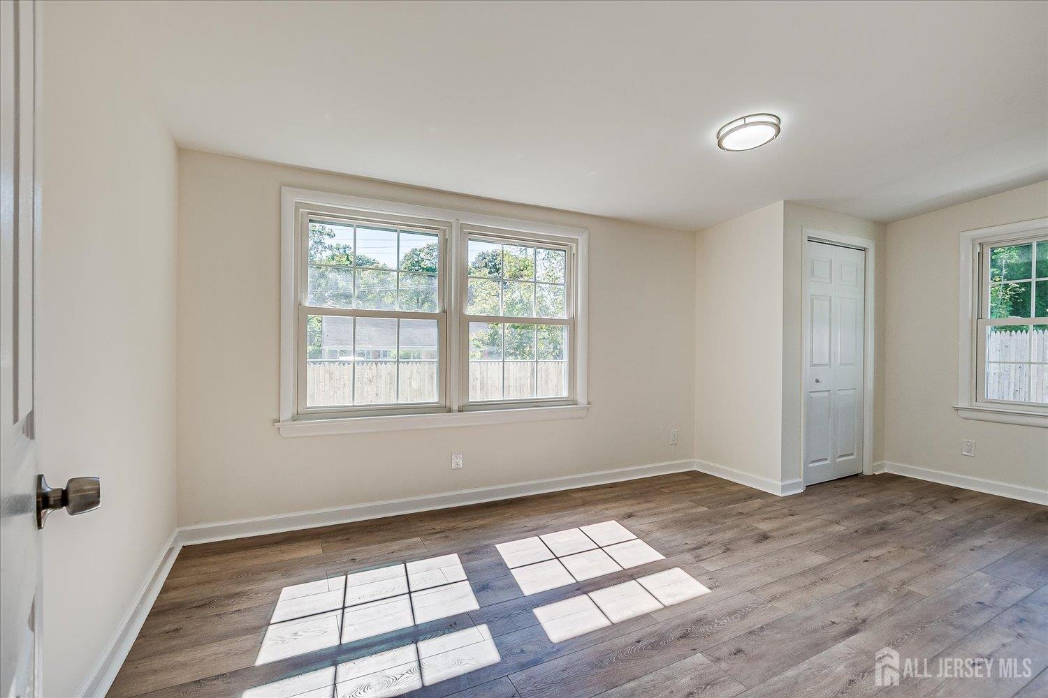 341 Victor Place Neptune, NJ 07753 - Photo 24 of 45 a view of an empty room with a window