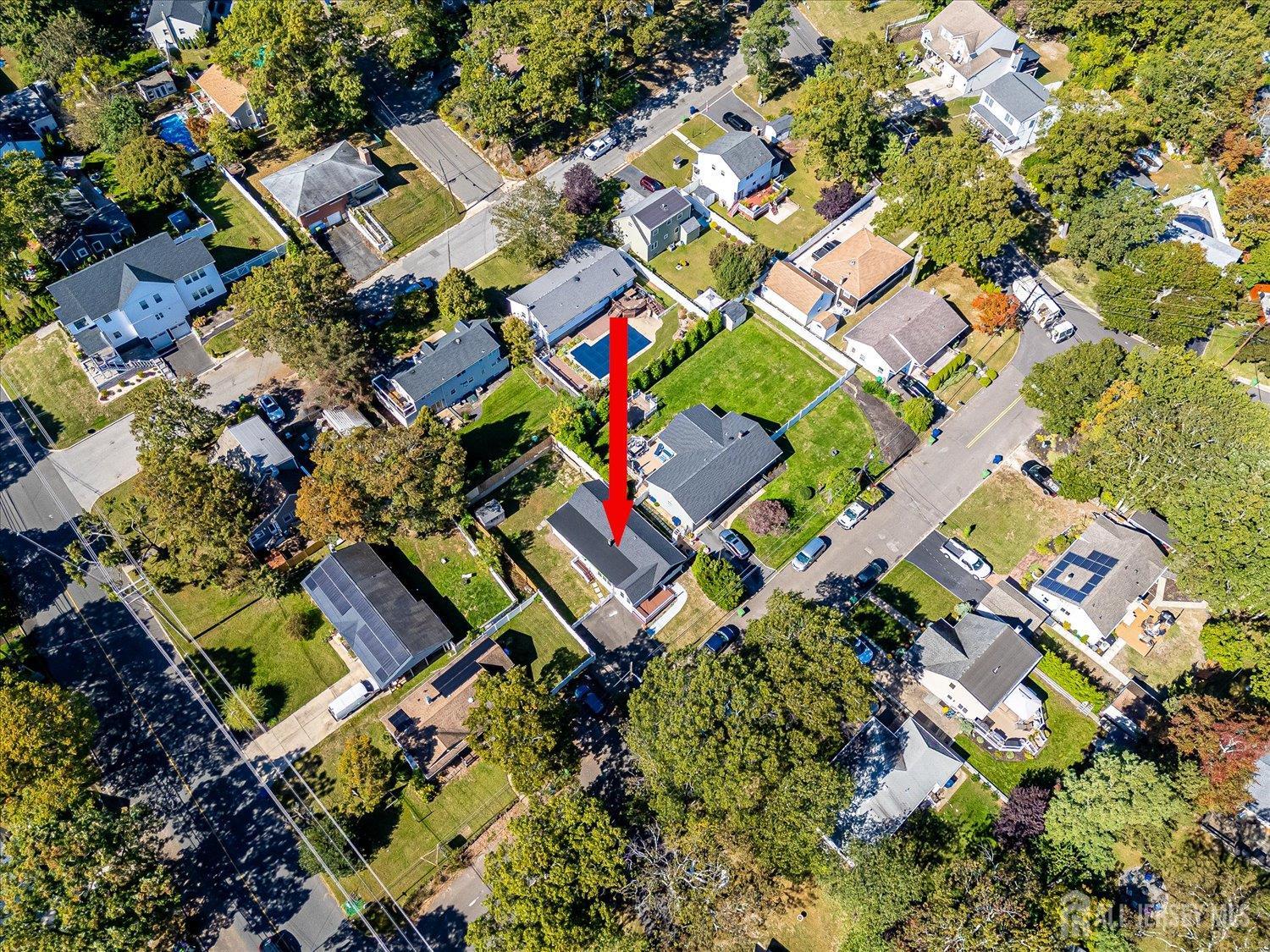 341 Victor Place Neptune, NJ 07753 - Photo 33 of 45 an aerial view of residential house with outdoor space and swimming pool