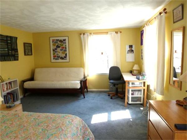 29 Concord Road Bedford, MA 01730 - Photo 12 of 24 a living room with furniture and a window