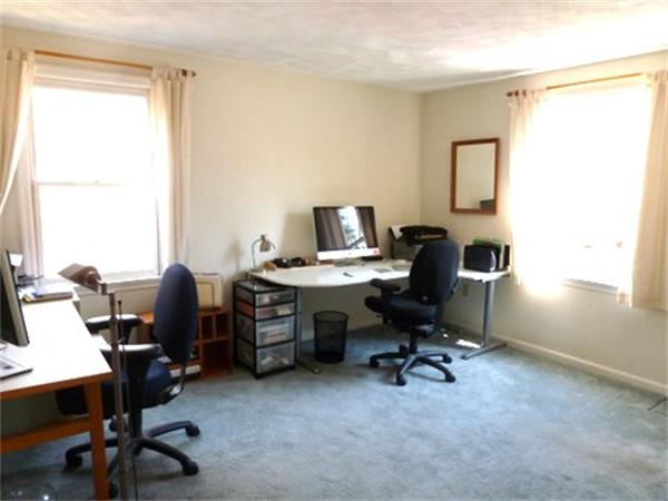 29 Concord Road Bedford, MA 01730 - Photo 15 of 24 a view of a workspace with furniture and a window